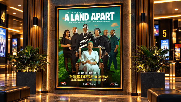 Movie poster for "A Land Apart" displayed in a cinema lobby
