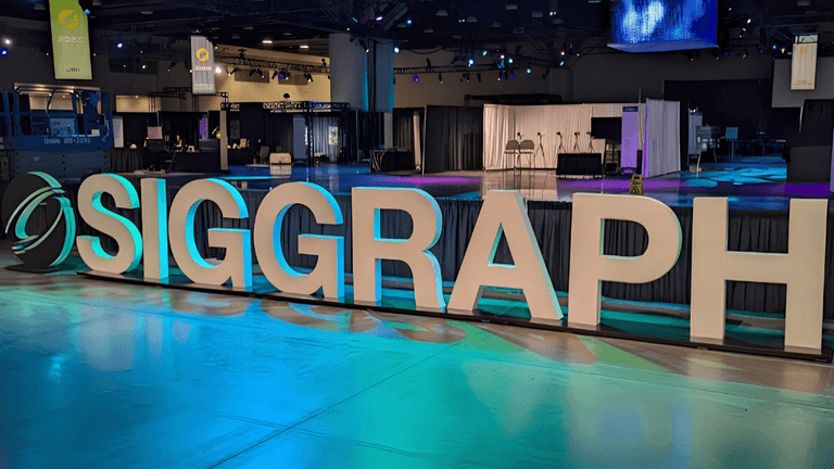 SIGGRAPH exhibition display inside a convention hall showcasing the annual computer graphics conference.