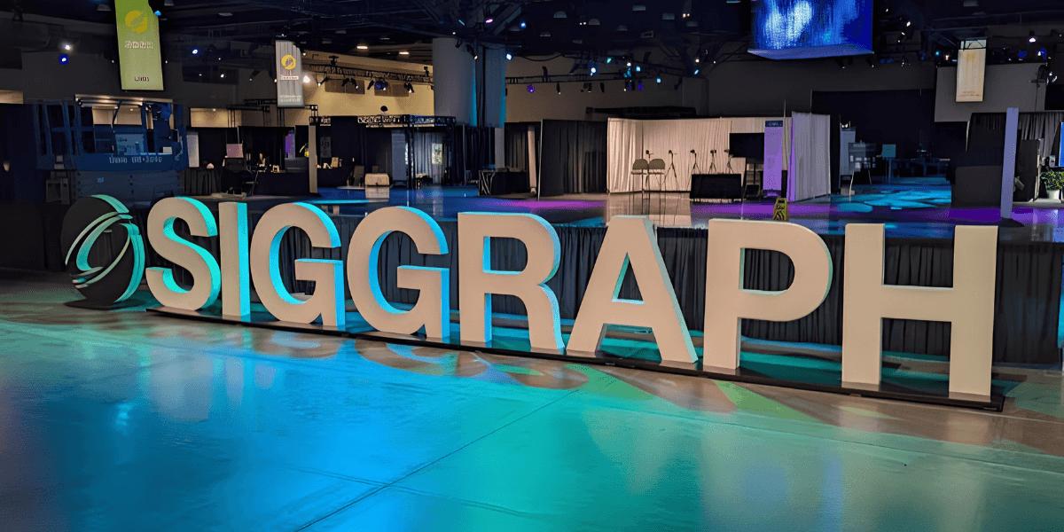 SIGGRAPH exhibition display inside a convention hall showcasing the annual computer graphics conference.